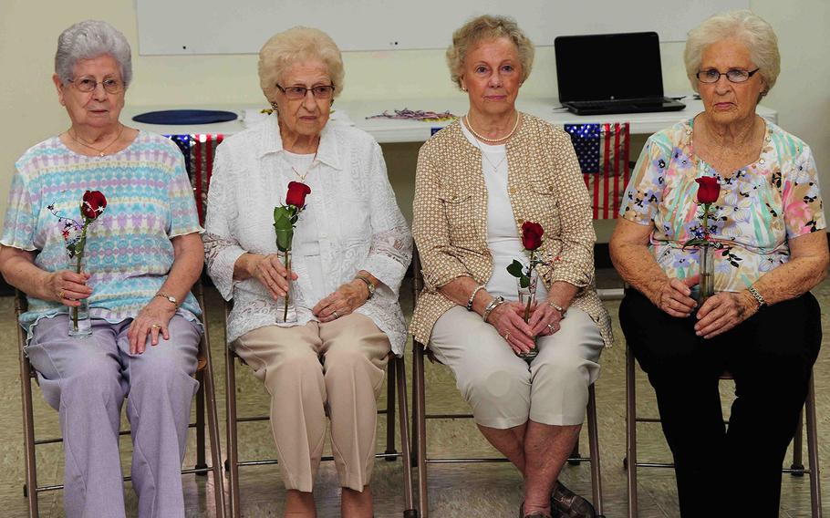 In an August, 2015 ceremony at Milan, Tenn., four surviving spouses of Korean War veterans received roses in memory of their late husbands and to recognize their personal sacrifices during the war. From left to right: Jean Cole (Ralph W. Cole), Jane Powers Montgomery (L.L. Powers), Mildred Hill (G. Edwin Hill), and Margie Hilliard Holt (David B. Hilliard).