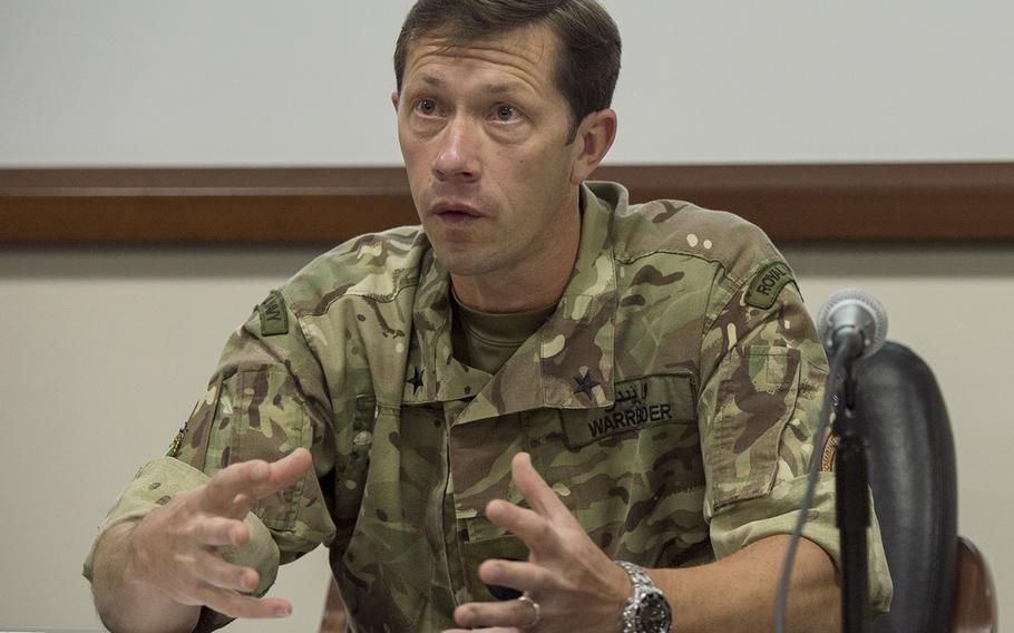 Combined Maritime Forces deputy commander and leader of the exercise Royal Navy commodore William Warrender answers questions about this year's International Mine Countermeasures Exercise during a press conference in Bahrain April 9, 2016. 