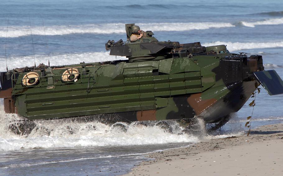 Marines land their amphibious assault vehicle 7 during amphibious operations during Exercise Iron Fist 2013 at Marine Corps Base Camp Pendleton, Calif. On April 27, 2016, the House Armed Services Committee rejected a bid to rename the vehicles in honor of an Iraq War unit.