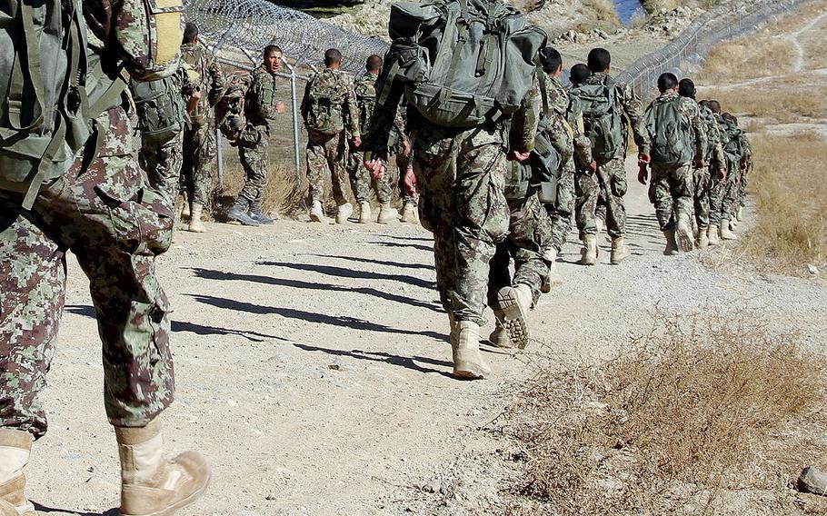 Afghan National Army commando recruits participate in a foot march during the Commando Selection and Assessment Course on Nov. 19, 2013, on Camp Commando near Kabul, Afghanistan.