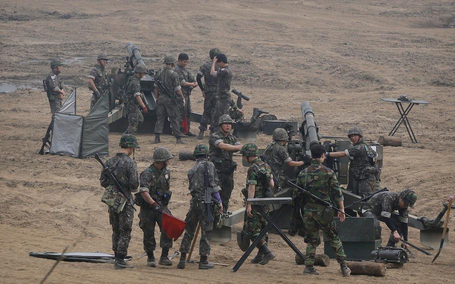 South Korean army soldiers prepare to fire 105mm howitzers during an exercise in Paju, South Korea, near the border with North Korea Wednesday, June 22, 2016. In a remarkable show of persistence, North Korea on Wednesday fired two suspected powerful new Musudan mid-range missiles, U.S. and South Korean military officials said, but at least one of the launches apparently failed, Pyongyang's fifth such reported flop since April.