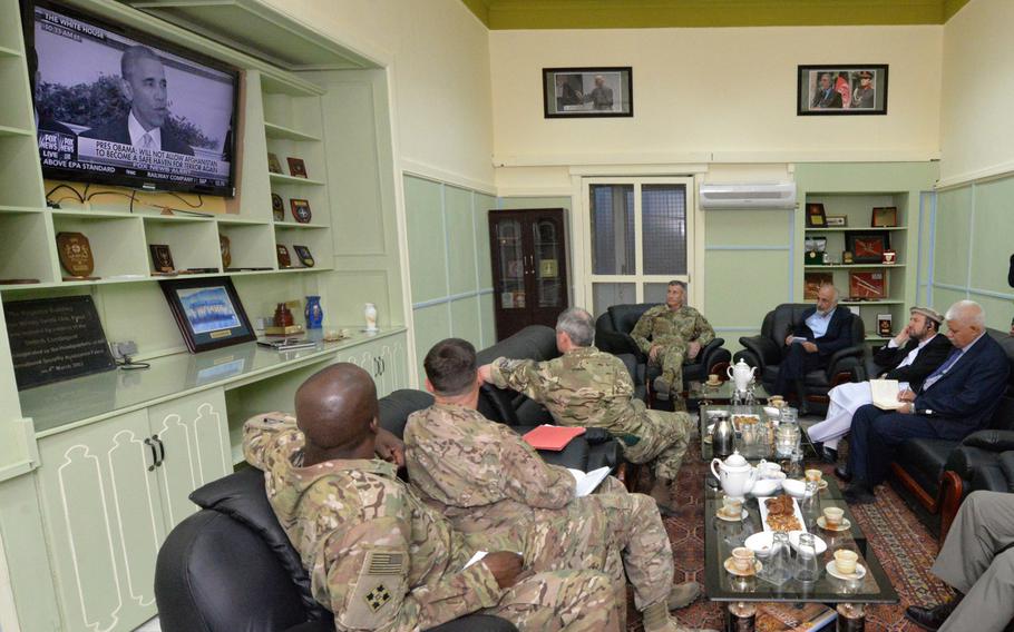 Gen. John Nicholson, background, Resolute Support mission and U.S. Forces-Afghanistan commander, listens July 6, 2016, as President Barack Obama announces that the U.S. will keep 8,400 troops in Afghanistan. With Nicholson are Minister of Defense Abdullah Khan Habibi, Minister of Interior Taj Mohammad Jahid and National Security Adviser Hanif Atmar at Resolute Support Headquarters in Kabul.