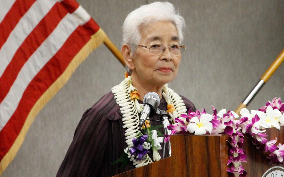 Yuko O'Reilly, the mother of the Wolfhounds, speaks during a reception at the Honolulu airport July 29, 2016. She is the widow of Hugh F. O'Reilly, the soldier who ignited the decades-long commitment by the 27th Infantry Regiment to improve the lives of orphans at the Holy Family Home in Osaka, Japan.