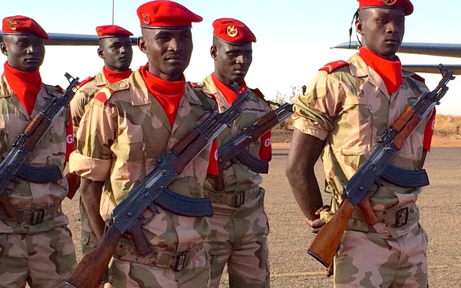 In a March, 2014 file photo, Nigerien troops take part in closing ceremony for Flintlock 2014 in Niamey, Niger.