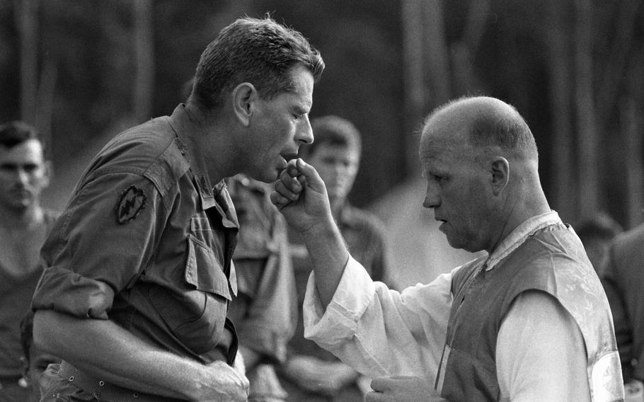 Maj. Michael S. Filip of the Archdiocese of Detroit holds chapel services near Plei Djereng, Vietnam on Nov. 20, 1966.