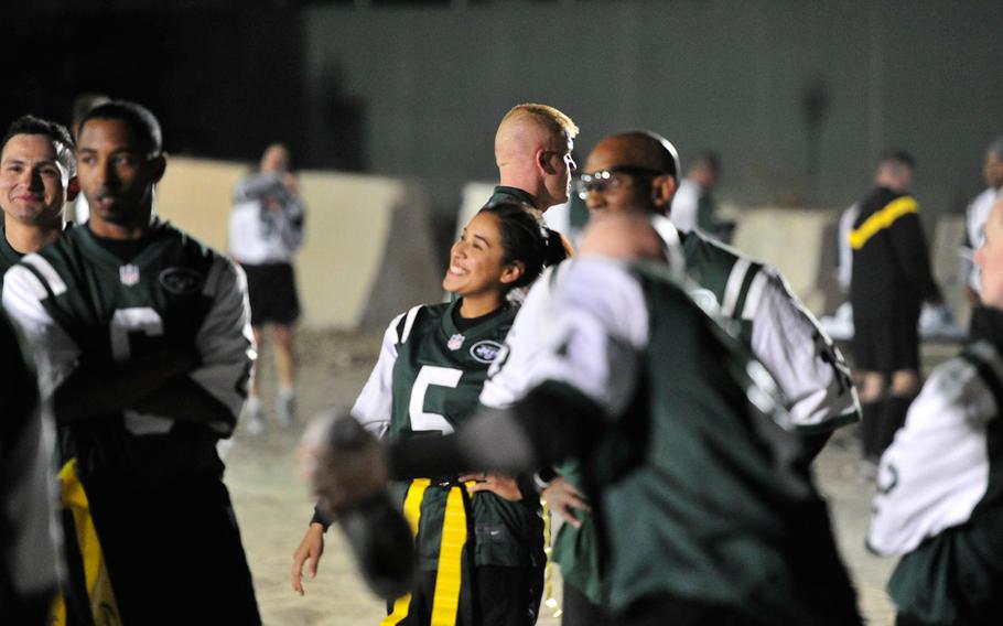 The military service members of U.S. Forces Afghanistan begin their 2016 Thanksgiving celebration with a Turkey Bowl football game at Bagram Airfield, Nov. 23, 2016.