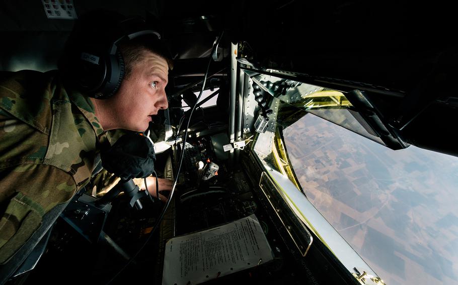 Senior Airman Kix Payne, a boom operator with the 340th Expeditionary Air Refueling Squadron, prepares for a Marine EA-6B Prowler to refuel over Iraq on Tuesday Nov. 29, 2016. Airstrikes by coalition aircraft damaged four bridges over the Tigris River in Mosul, rendering them useless to militants, Pentagon officials said Wednesday.