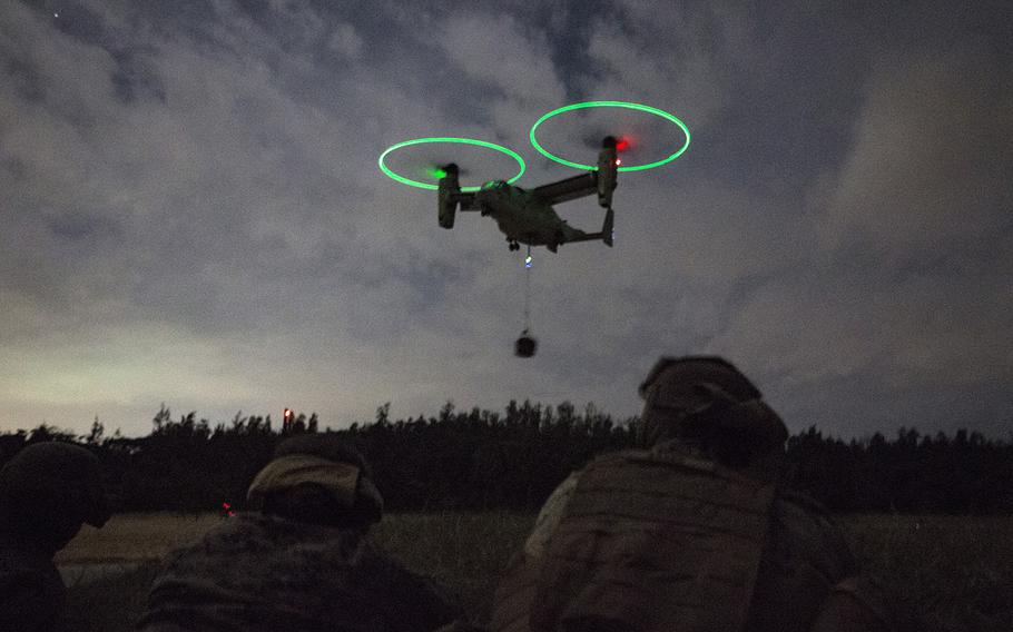 An MV-22B Osprey tiltrotor aircraft performs an external lift training maneuver on Okinawa, Japan, Dec. 8, 2016. An Osprey crash landed just off the coast of Okinawa on Tuesday, Dec. 13.