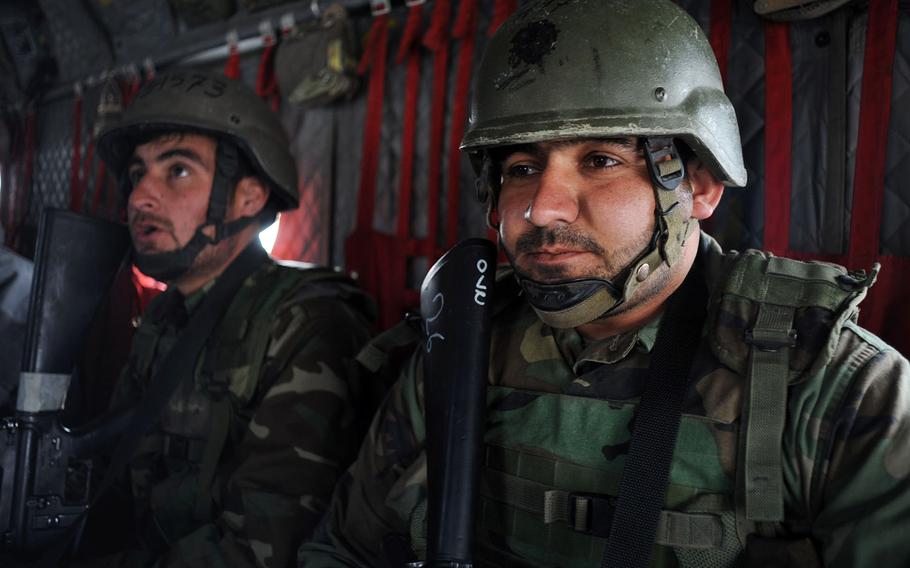 In a January, 2016 file photo, members of the Afghanistan national army train for an air assault mission on Contingency Outpost Connolly in Nangarhar, Afghanistan.