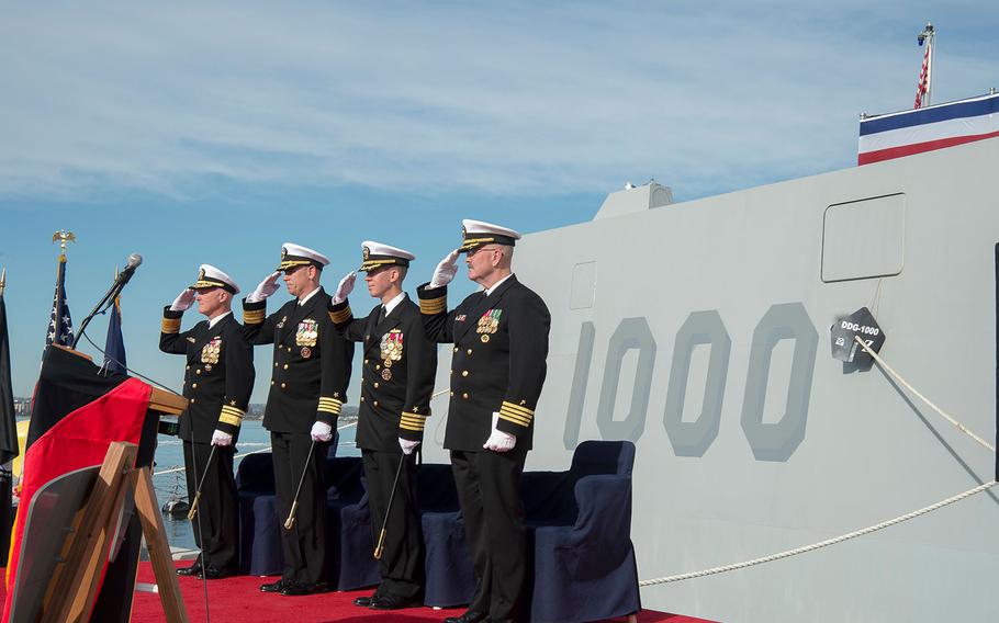 Left to right, Vice Adm. Thomas Rowden, commander, Naval Surface Forces, Capt. James A. Kirk, outgoing commanding officer of the USS Zumwalt, Capt. Scott A. Tait, in-coming CO of the Zumwalt, and Capt. W. Kyle Fauntleroy, Force Chaplain, Surface Force, U.S. Pacific Fleet during a change of command ceremony at Naval Base San Diego on Dec. 20, 2016.