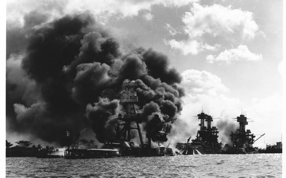 Burning and damaged ships are seen at Pearl Harbor on Dec. 7 1941.