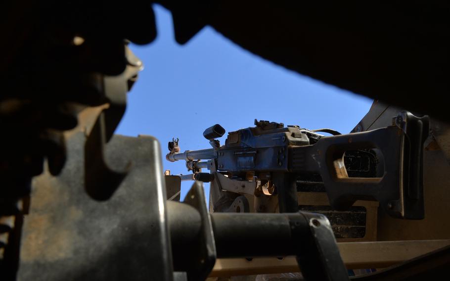 A PK machine gun is pictured here in the turret of an Iraqi army Humvee, Nov. 19, 2016. Amnesty International found that Iraqi army weapons supplied by the U.S., Russia and other countries have gotten into the hands of Iran-backed Shiite militias accused of committing war crimes in the campaign to rout the Islamic State group from Iraq.
                