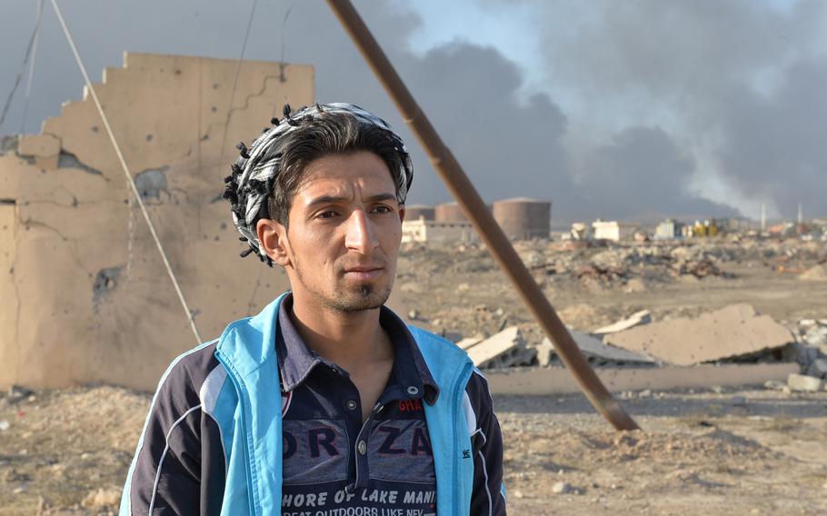 Mohammed Makhmoud Jassim, pictured here in Qayara, Iraq, on Nov. 21, 2016, said he has fought with a Popular Mobilization Forces militia for two years and has seen the organization capture, interrogate and kill many men it suspected of fighting with the Islamic State group. 