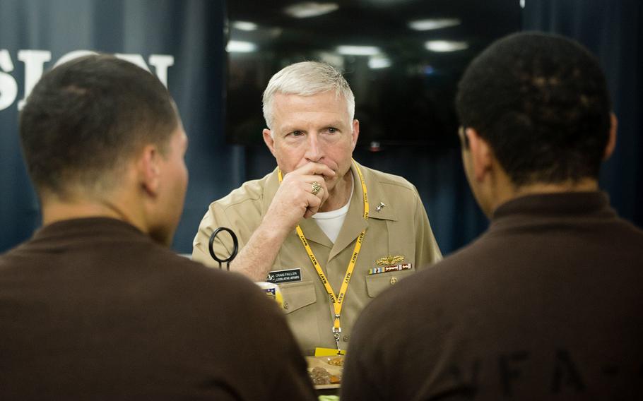 Rear Adm. Craig Faller eats lunch with sailors on USS John C. Stennis' mess decks during Rim of the Pacific 2016. 