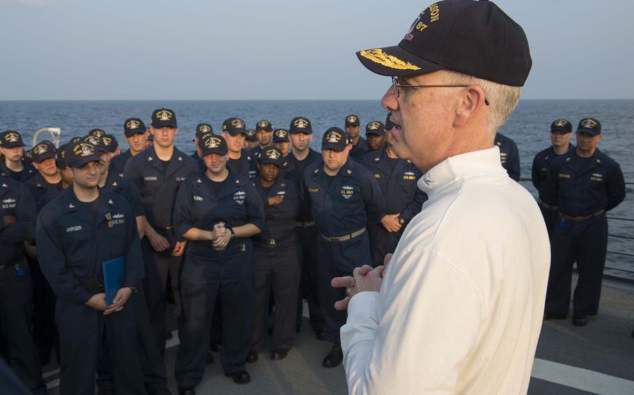 Rear Adm. Kevin M. Sweeney speaks with sailors during a visit aboard the guided-missile destroyer USS Mason on Nov. 29, 2013.
                