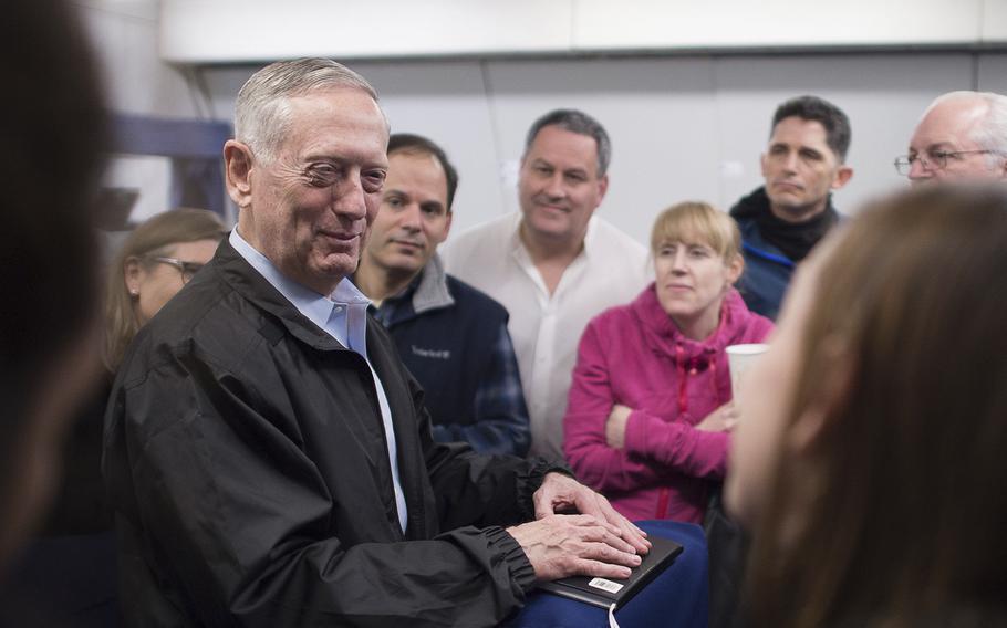 Secretary of Defense Jim Mattis answers questions during a flight to Korea. on Feb. 1, 2017. 