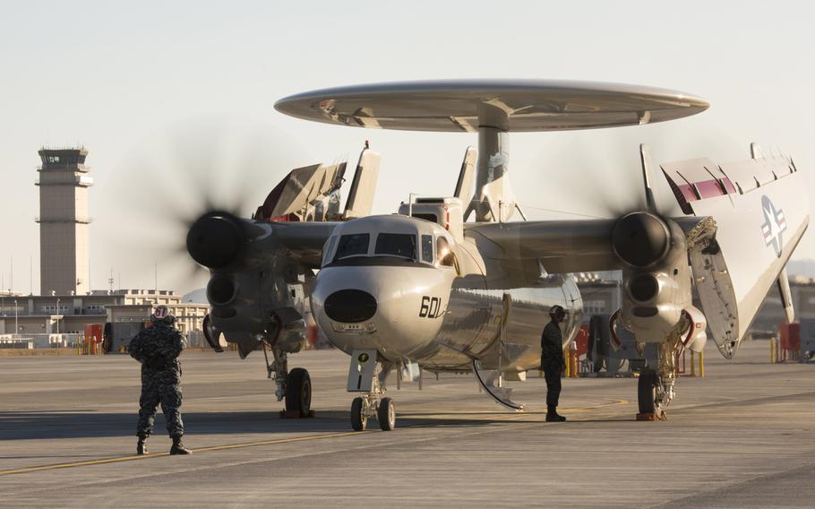 A Navy E-2D Advanced Hawkeye with Carrier Airborne Early Warning Squadron 125 lands at Marine Corps Air Station Iwakuni, Japan, Wednesday, Feb. 2, 2017.