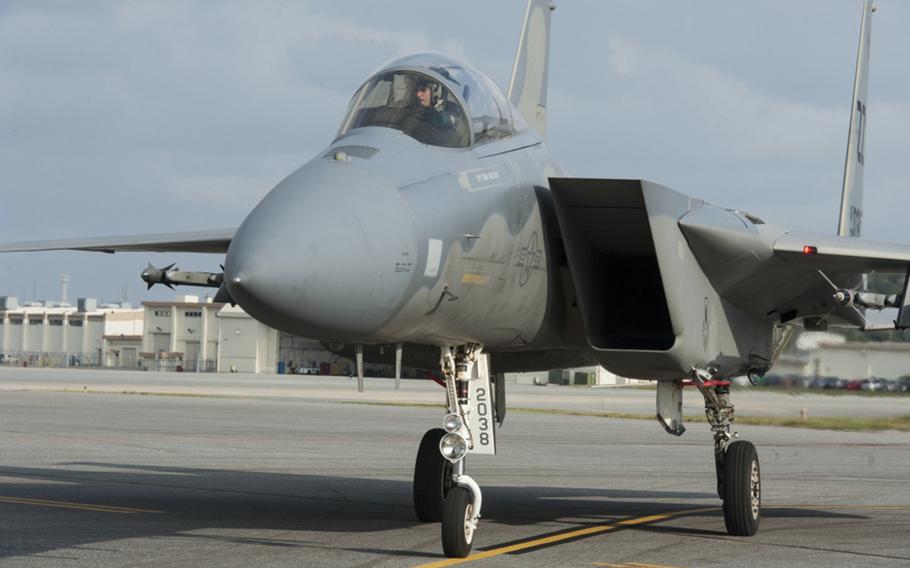 A U.S. Air Force F-15 Eagle assigned to the 67th Fighter Squadron arrives at a refueling spot during a surge operation Jan. 11, 2017, at Kadena Air Base, Okinawa.