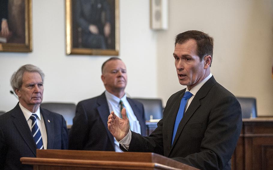 Retired Marine Maj. Fred Galvin speaks during a briefing on Capitol Hill at the House Cannon building on Thursday, Feb. 16, 2017. Galvin was the commander of the Marine Corps' first-ever special operations unit, which deployed to Afghanistan in February 2007 and was accused of firing indiscriminately after a car bomb attack on March 4. Looking on are Congressman Walter Jones Jr., R-N.C., left, and Retired Marine Col. Steve Morgan, who was one of the three officers on the Marine jury that exonerated Galvin's unit.