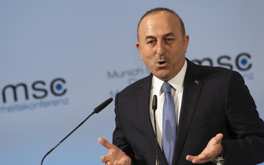 Turkey's foreign minister Mevlut Cavusoglu, speaks on the last day of the Munich Security Conference in Munich, Germany, Sunday, Feb. 19, 2017.
