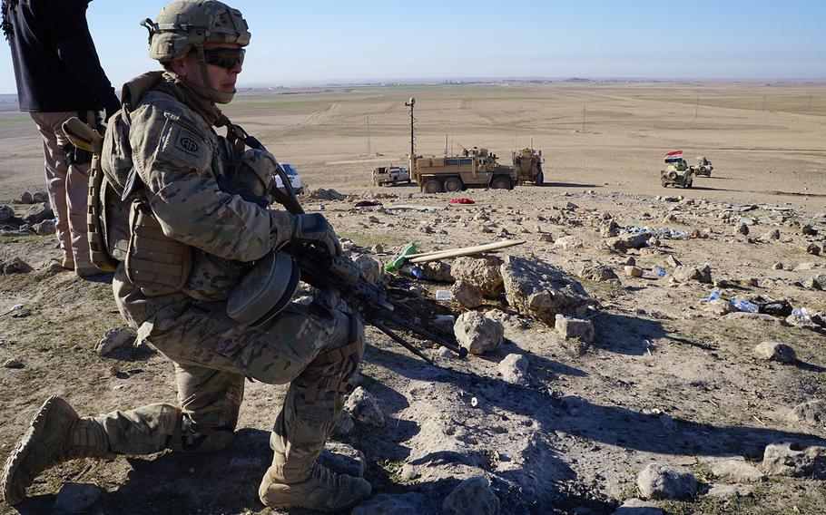Members of the 9th Iraqi Army Division and the U.S. Army advise and assist team watch a unmanned aerial system while tracking the progress of brigades clearing the village of Bakhaira, Iraq, on the first day of the battle to liberate Mosul, Feb. 19, 2017.
