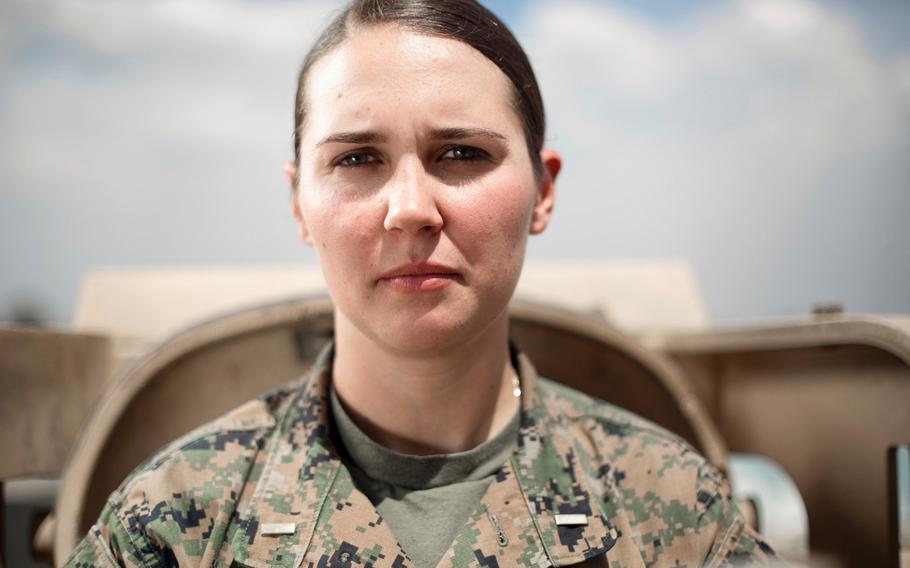 Standing in front of an M1A1 Abrams tank, 2nd Lt. Lillian Polatchek is the first female Marine Tank Officer after graduating as the distinguished honor graduate of her Army's Armor Basic Officer Leaders Course on April 12, 2017.