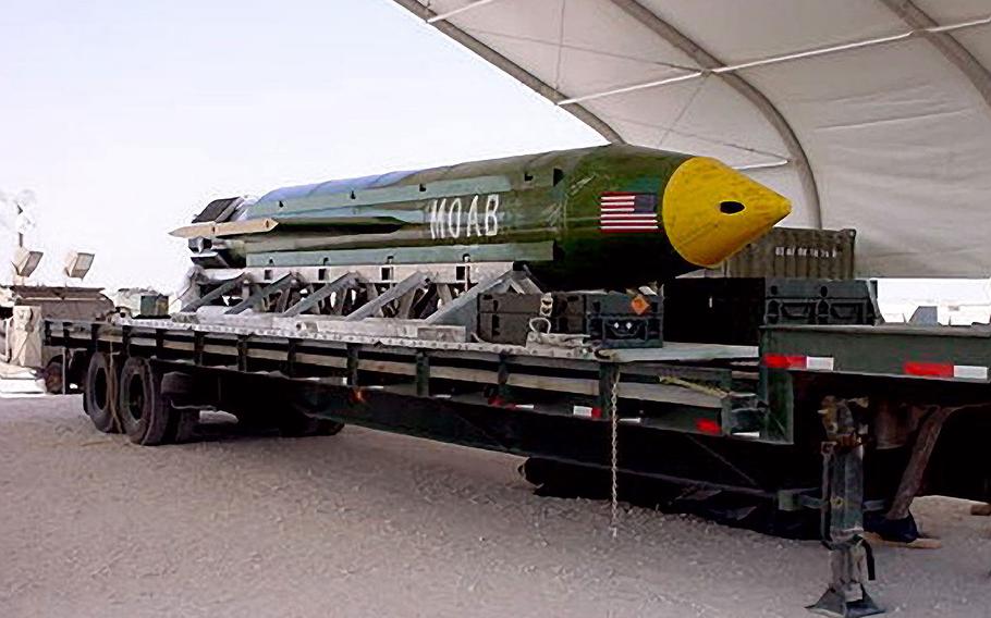 The GBU-43/B Massive Ordnance Air Blast bomb sits at an air base in Southwest Asia. The MOAB is also called "The Mother of all Bombs."