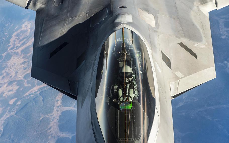 An Air Force F-22 Raptor receives fuel during a training exercise, in the high Arctic, on Oct. 18, 2016. The Pentagon said Thursday, May 4, 2017, that Raptor fighter jets intercepted a formation of Russian bombers and fighters in international airspace off the coast of Alaska on Wednesday.