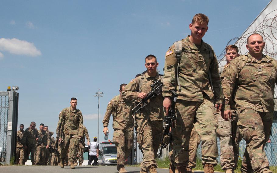 Soldiers from the 2nd Battalion, 12th Infantry Regiment, 2nd Infantry Brigade Combat Team, 4th Infantry Division, depart for training after a flight to Nuremberg Airport, Germany on May 16th, 2017. The battalion, which flew to Germany on short notice as part of an Emergency Deployment Readiness Exercise, will be using equipment from Army Prepositioned Stock sites during follow-on training in Bavaria.