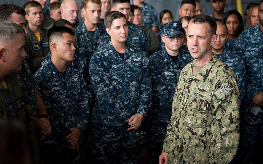 Chief of Naval Operations Adm. John Richardson meets the crew of the "Island Knights" Helicopter Sea Combat Squadron (HSC) 25 at Andersen Air Force Base on May 17, 2017.