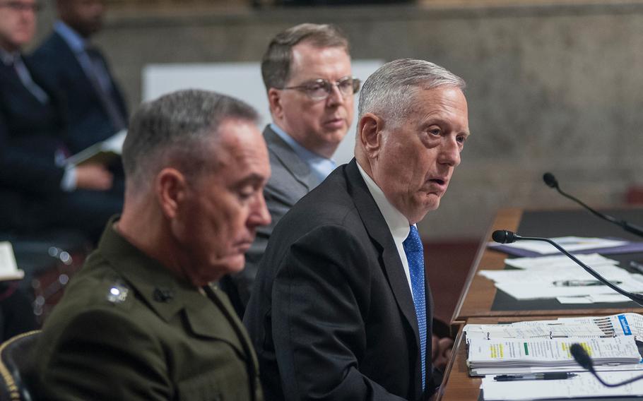 Defense Secretary Jim Mattis, center, testifies before the Senate Armed Services Committee on June 13, 2017, during a hearing on Capitol Hill in Washington, D.C. At left is Chairman of the Joint Chiefs of Staff General Joseph Dunford.