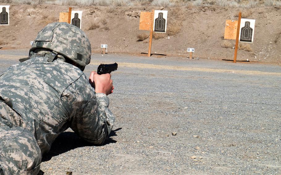 A U.S. Army Reserve soldier fires an M9 Beretta handgun at a firing range on Camp Williams, near Salt Lake City, Utah, March 4, 2017. 