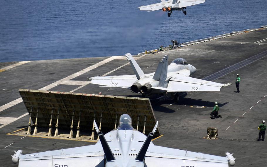 A Super Hornet launches from the flight deck of the aircraft carrier USS Nimitz in the Arabian Gulf, Saturday, July 29, 2017.