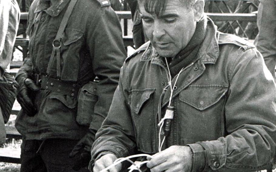 In an undated photo, Maj. John Fasulo manages a length of detonating cord in a demonstration during his time as an instructor at The Basic School.