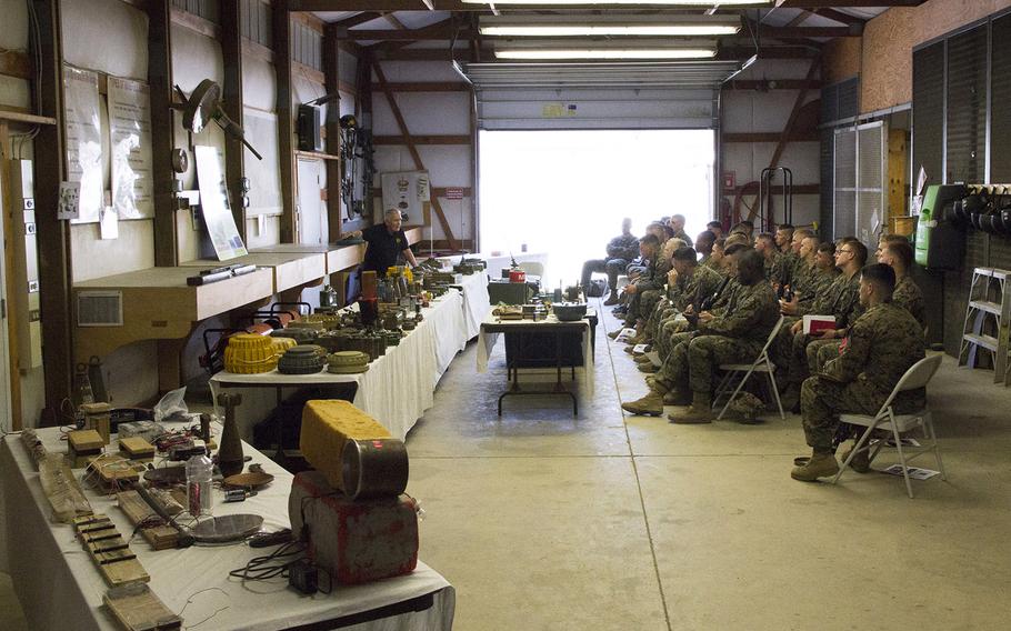 Retired U.S. Marine Corps Maj. John Fasulo talks about explosive devices during a class for Marines at Fort A.P. Hill, Va., in June, 2017.