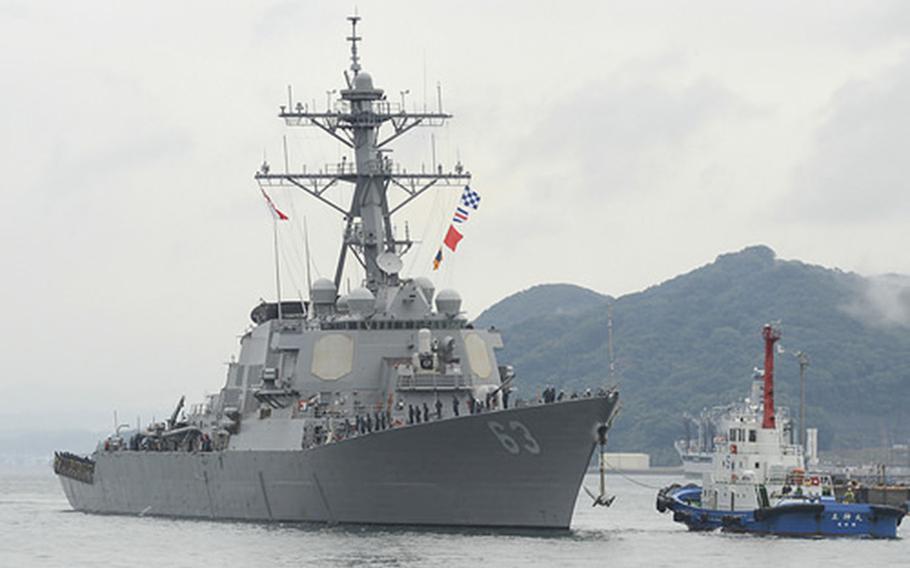 The guided-missile destroyer USS Stethem pulls into Sasebo Harbor, Japan, for a routine port visit to Commander Fleet Activities Sasebo on Nov. 13, 2015.