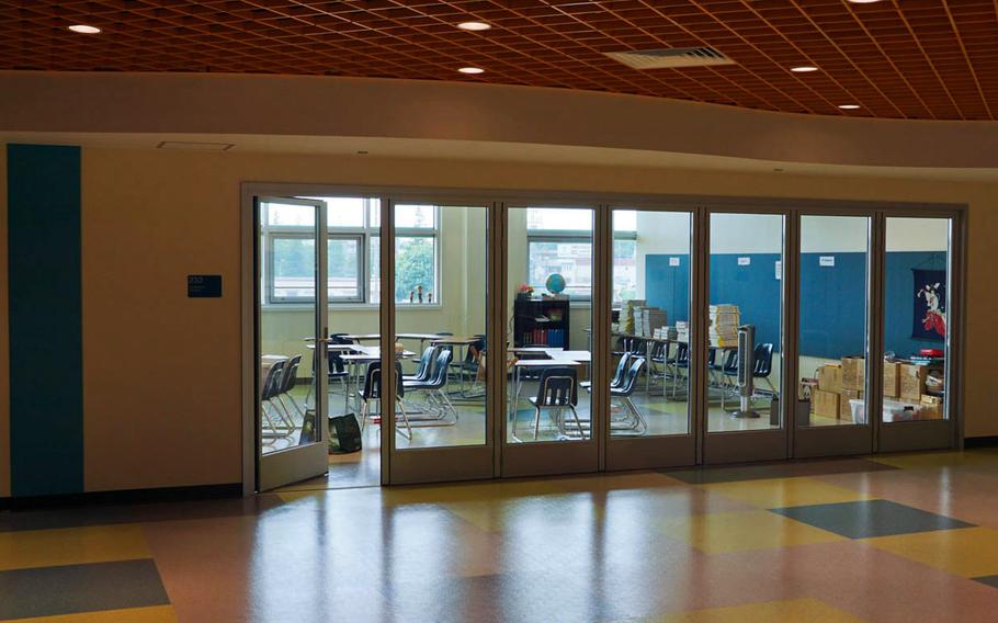 A "learning studio" at the new high school at Yokota Air Base, Japan, features glass walls and large windows that allow natural light into the building.