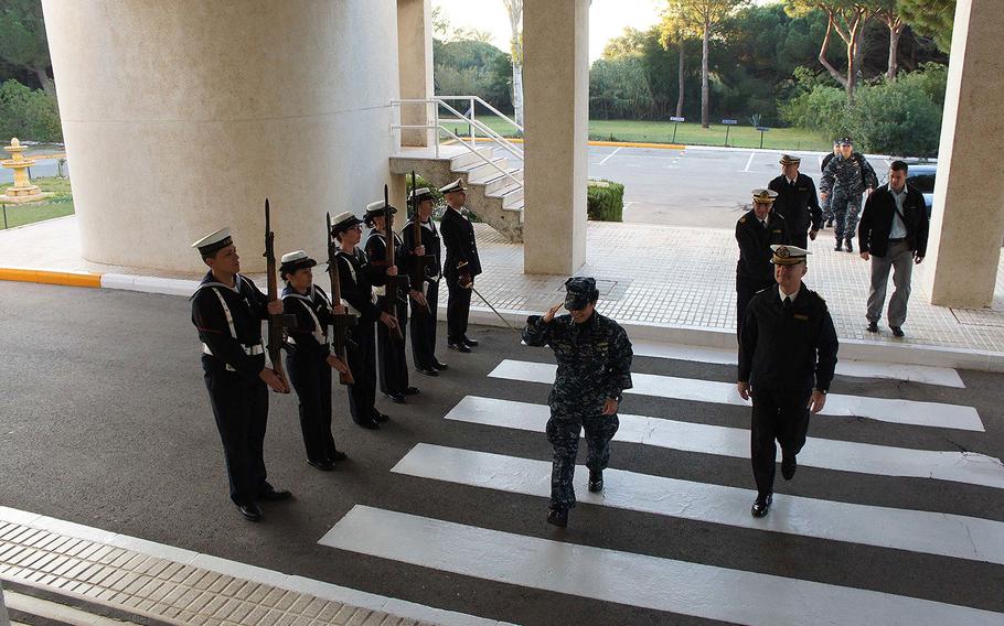 Commander, U.S. Naval Forces Europe-Africa, Adm. Michelle Howard, is rendered honors as she arrives at the Spanish Headquarters building during her visit to Naval Station Rota on Dec. 21, 2016.