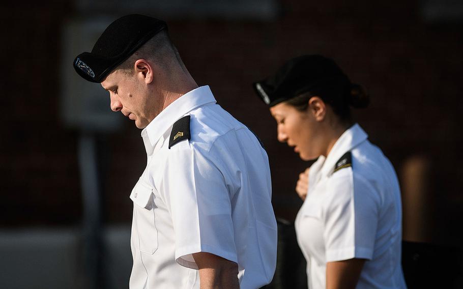 Army Sgt. Bowe Bergdahl, left, arrives with his legal team for a motions hearing on Wednesday, Sept. 27, 2017, in Fort Bragg, N.C.