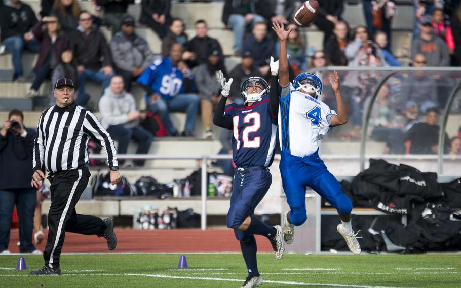Rota's Sammy Molina, right, deflects a pass intended for Spangdahlem's Sage Kown at Vogelweh, Germany, on Saturday, Nov. 4, 2017.
                