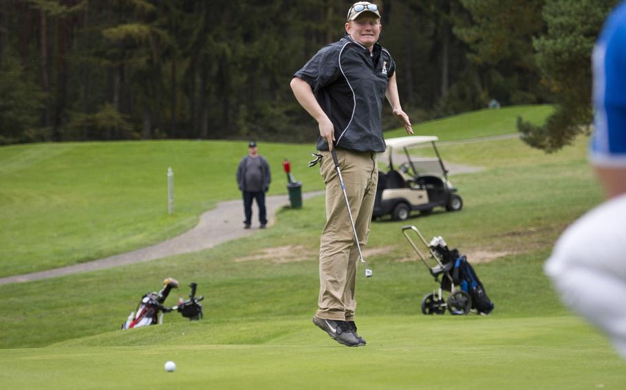 Stuttgart's Frank Whitworth encourages his putt to go in during the DODEA-Europe golf championship at Rheinblick golf course in Wiesbaden, Germany, on Friday, Oct. 13, 2017.