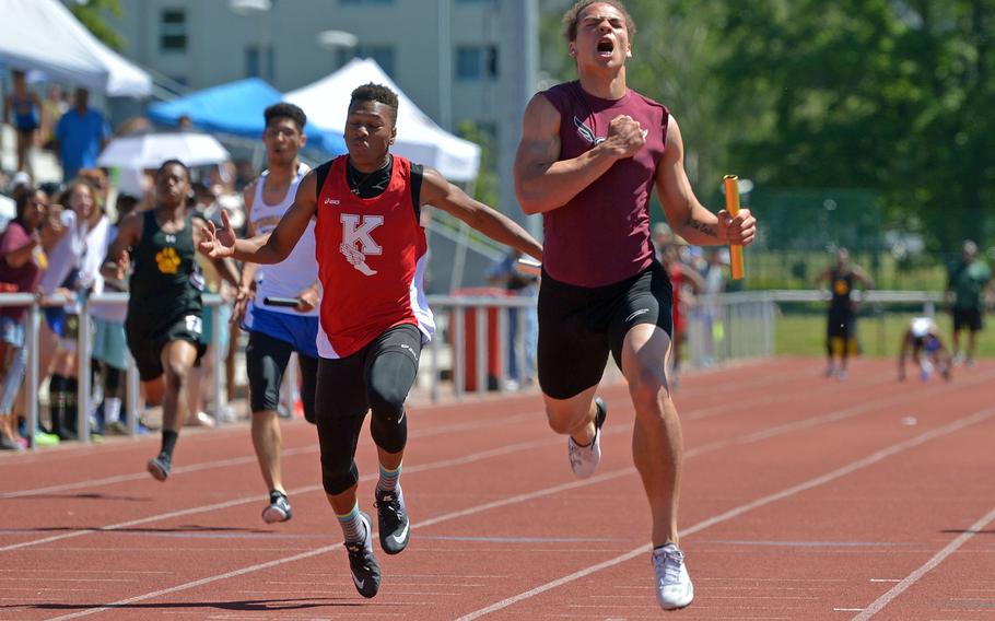 Vilseck's Zavier Scott celebrates after anchoring the 4x100-meter relay team at the DODEA-Europe track and field finals in Kaiserslautern, Germany, Saturday, May 27, 2017. Scott and teammates Corey Coombs, Hayden Swan and Devin Gamble won the race in 43.95 seconds.
                