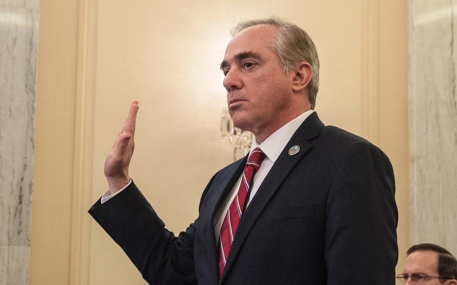 VA Secretary David Shulkin raises his hand to take an oath before the start of a Senate Committee on Veterans Affairs hearing on Wednesday, Jan. 17, 2018, on Capitol Hill in Washington, D.C.