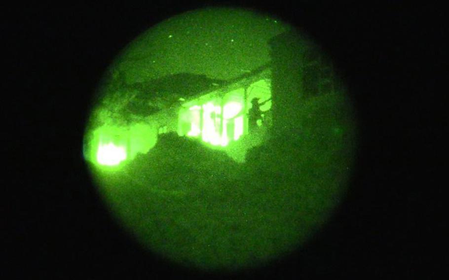 Afghan Special Security Forces prepare to enter an ISIS compound in Darzab district, Jowzjan province on Mar. 21, 2018. U.S. and Afghan special operations forces killed nearly two dozen ISIS fighters in northern Afghanistan last week.