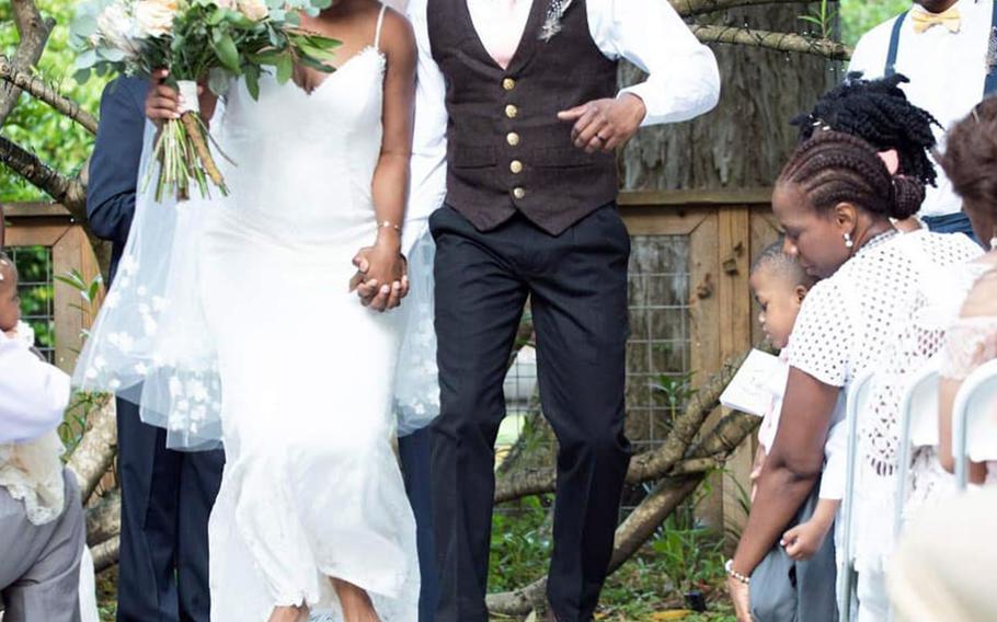 The Marions walk down the aisle in Houston on April 28, 2018.