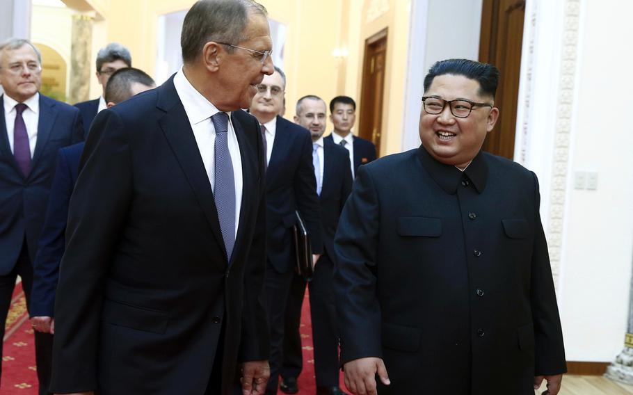 Korean leader Kim Jong Un, right, and Russia's Foreign Minister Sergei Lavrov walk, during a meeting in Pyongyang, North Korea, Thursday, May 31, 2018.