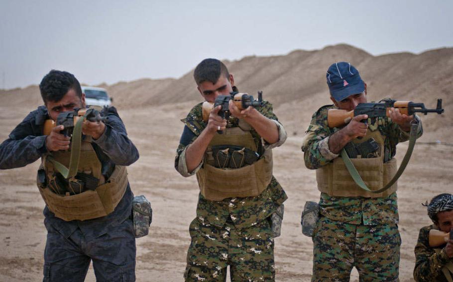 Syrian Democratic Forces practice marksmanship before a live-fire exercise near Shaddadi, Syria, May 27, 2018. The U.S.-led international coalition continues to train local forces in Syria to combat ISIS, although the group has lost most of the territory it once held in the region.
