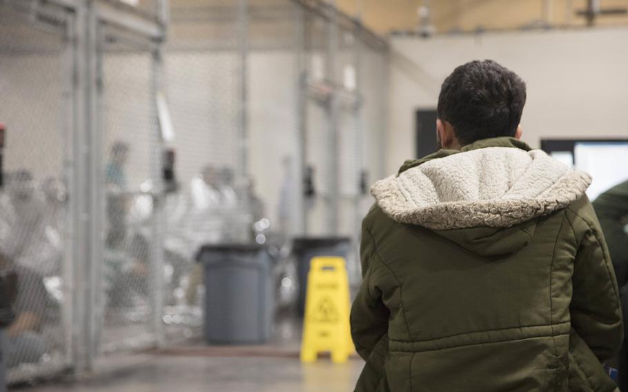 U.S. Border Patrol agents conduct intake of illegal border crossers at the Central Processing Center in McAllen, Texas, Sunday, June 17, 2018.
