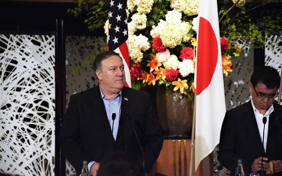 U.S. Secretary of State Mike Pompeo stands at a news conference at Japan's Ministry for Foreign Affairs, where he and his Japanese and South Korean counterparts discussed his recent talks with North Korean leaders in Pyongyang.