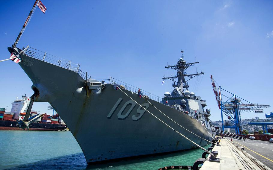 In a June 19, 2018 file photo, the guided-missile destroyer USS Jason Dunham is moored at the pier in Haifa, Israel, during a scheduled port visit.